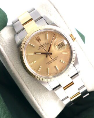 Rolex Oyster Perpetual Date 15053 Champagne Automatic 34mm Unisex Watch